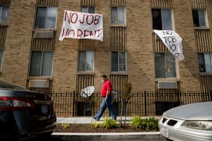 In this May 20, 2020 photo, signs that read