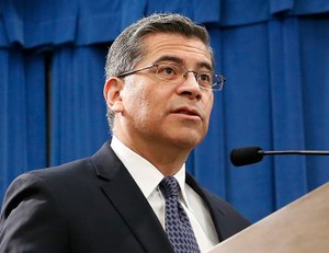 In this Feb. 15, 2019, photo, California Attorney General Xavier Becerra speaks at a news conference in Sacramento, Calif. The U.S. Department of Education is attempting to take pandemic relief funds away from K-12 public schools and divert the money to private schools, California and four other states argued in a lawsuit filed Tuesday, July 7, 2020, against the Trump administration. Becerra and Michigan Attorney General Dana Nessel announced the lawsuit, which was joined by Maine, New Mexico, Wisconsin, and the District of Columbia. Image: AP Photo/Rich Pedroncelli
