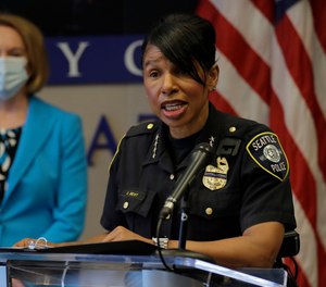 Seattle Police Chief Carmen Best, right, speaks, Monday, July 13, 2020, during a news conference at City Hall in Seattle with Mayor Jenny Durkan.