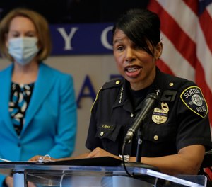 Seattle Police Chief Carmen Best, right, speaks, Monday, July 13, 2020, during a news conference at City Hall in Seattle with Mayor Jenny Durkan. (AP Photo/Ted S. Warren)