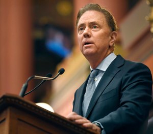 In this Feb. 5, 2020 file photo, Connecticut Gov. Ned Lamont delivers the State of the State address at the State Capitol in Hartford, Conn.