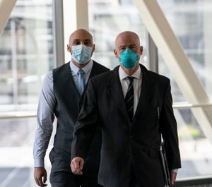 Former Minneapolis police officer J. Alexander Kueng, left, arrives with his attorney for a hearing in Minneapolis, Minn., on Tuesday, July 21, 2020. (Renee Jones Schneider/Star Tribune via AP)