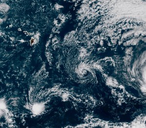 This GOES-17 taken at 3:30 p.m. EDT, Thursday, July 23, 2020, shows Hurricane Douglas, right, churning in the Pacific Ocean heading towards Hawaii, left. The storm is currently a Category 3 hurricane but is expected to weaken before it arrives in the state this weekend.