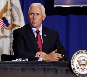 Vice President Mike Pence speaks at the NC Biotechnology Center where Phase-III trials for a Coronavirus vaccine are underway in Durham, N.C., Wednesday, July 29, 2020. (AP Photo/Gerry Broome)