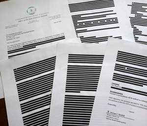 This photo shows a report provided by the Virginia Office of the State Inspector General to The Associated Press in response to an open records request.