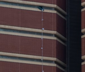 Two inmates escaped from the Oklahoma County jail by tying together bedsheets to use as a rope. (Photo/Dave Morris of The Oklahoman via AP)