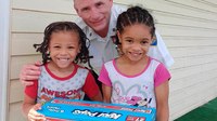 Kids surprise cop with ice pop on hot summer day; he returns the favor