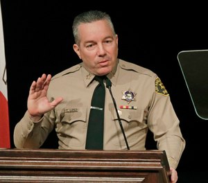 In this Dec. 3, 2018 file photo, Los Angeles County Sheriff Alex Villanueva speaks during a ceremony in Monterey Park, Calif. (AP Photo/Jae C. Hong, File)