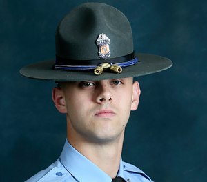 In this undated photo released by the Georgia Department of Public Safety, State trooper Jacob Gordon Thompson is seen in an official portrait. (Georgia Department of Public Safety via AP)