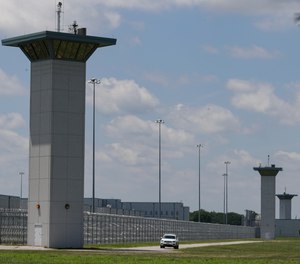 In this July 17, 2020, file photo the federal prison complex in Terre Haute, Ind., is shown.