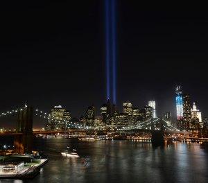 In this Sept. 11, 2012 file photo, the Tribute in Light lights up lower Manhattan in New York. Plans are back on to beam twin columns of light into the Manhattan sky to represent the World Trade Center during next month’s anniversary of the 9/11 terror attacks.