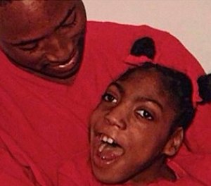 This undated family photo shows Timesha Beauchamp with her brother Steven Thompson. State regulators say a Southfield firefighter-paramedic misled a doctor on Beauchamp's condition before she was declared dead and later found alive at a funeral home.