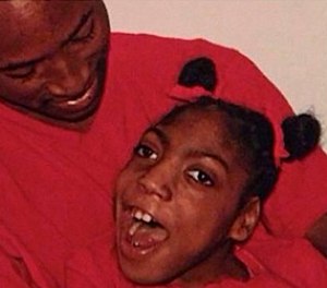 This undated family photo provided by Erica Lattimore through Fieger Law shows her daughter Timesha Beauchamp with her brother Steven Thompson in Southfield, Mich. Beauchamp, 20, was found alive at a funeral home after being declared dead and is hospitalized in critical condition on a respirator.