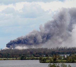 A fire at a chemical plant, BioLab Inc., burns on Thursday, Aug. 27, 2020, in Westlake, La., in the aftermath of Hurricane Laura.