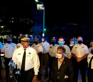 Chicago Police Superintendent David Brown and Mayor Lori Lightfoot speak outside Stroger Hospital Sunday, Aug. 30, 2020, after two Chicago police officers were wounded in a shooting during a traffic stop.