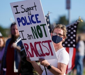 Law enforcement supporters protest during a Back the Blue rally Thursday, Sept. 3, 2020, in West Valley City, Utah.