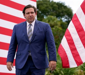 Florida Gov. Ron DeSantis attends an event with President Donald Trump on the environment at the Jupiter Inlet Lighthouse and Museum, Tuesday, Sept. 8, 2020, in Jupiter, Fla.