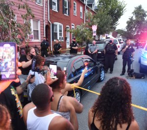 People chant during a protest at the scene of a police shooting on Laurel Street and Union Street in Lancaster city on Sunday, Sept. 13, 2020. (Andy Blackburn/LNP/LancasterOnline via AP)