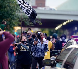 Black Lives Matter protesters march, Friday, Sept. 25, 2020, in Louisville. (Photo/AP Photo/Darron Cummings)