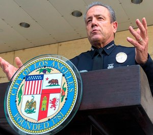 In this Aug. 26, 2020, file photo, Los Angeles Police Chief Michel Moore speaks during a news conference outside LAPD headquarters.