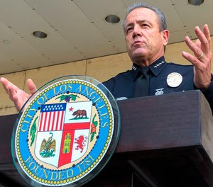 Police Chief Michel Moore does not have the authority to dismiss officers.