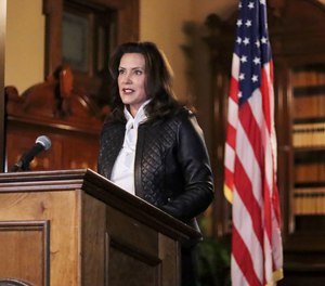 Gov. Gretchen Whitmer addresses the state during a speech in Lansing, Mich., Thursday, Oct. 8, 2020.