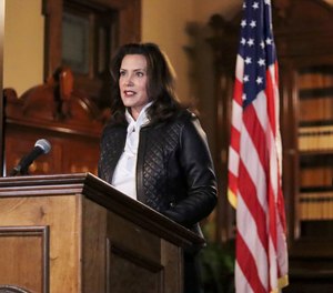 Michigan Gov. Gretchen Whitmer addresses the state during a speech in Lansing, Mich., Thursday, Oct. 8, 2020.