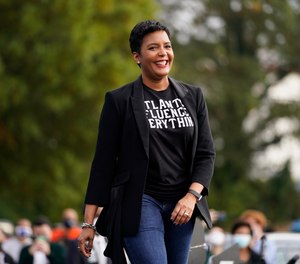 Atlanta Mayor Keisha Lance Bottoms arrives to speak during a drive-in rally in Atlanta, Tuesday, Oct. 27, 2020.