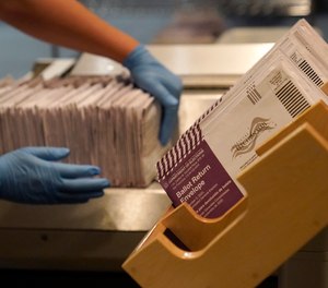 Envelopes containing ballots are shown at a San Francisco Department of Elections at a voting center in San Francisco.