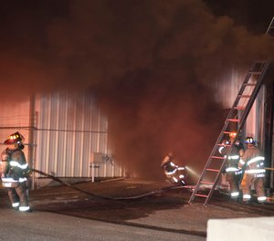 Tyler, Texas firefighters respond to a fire and explosion at the freezer buildings at Greenberg Smoked Turkeys Inc., Friday, Nov. 6, 2020. The explosion destroyed 87,000 turkeys and forced the facility to shut down for the rest of 2020.