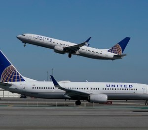 An off-duty EMT who performed CPR on a fellow flight passenger who later died from COVID-19 said he was offered a $200 voucher for the