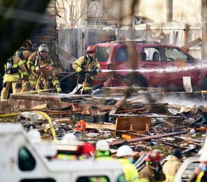 Firefighters work the scene of a deadly explosion that leveled a home in Omaha, Neb., Tuesday, Dec. 8, 2020. Two people were killed and two were critically injured in the blast.