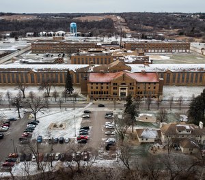 Snow coats the rooftops of the Minnesota Correctional Facility-Stillwater prison, where there are currently 25 to 30 open positions.