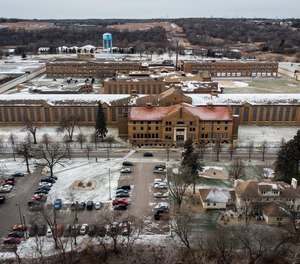 Snow coats the rooftops of the Minnesota Correctional Facility-Stillwater prison, where there are currently 25 to 30 open positions.