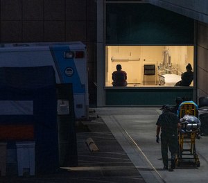 Los Angeles County ambulance crews have been told not to transport patients with virtually no chance of survival and to cut back on their oxygen use due to a COVID-19 surge that has critically overwhelmed hospitals across the county.