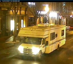 This image taken from surveillance video provided by Metro Nashville PD shows a recreational vehicle that was involved in a blast on Friday, Dec. 25, 2020 in Nashville, Tenn.