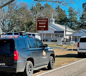 The Smith County Sheriff's Office investigates a fatal shooting incident at the Starville Methodist Church in Winona, Texas, on Sunday morning, Jan. 3, 2021.
