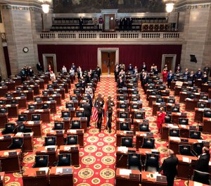 A Color Guard enters the Missouri House chamber to open the 2021 legislative session on Wednesday, Jan. 6, 2021, in Jefferson City, Missouri.