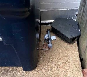 An explosive device is shown outside of the Republican National Committee office, Wednesday, Jan. 6, 2021 in Washington.