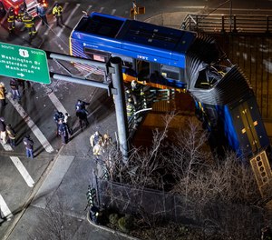 A bus in New York City that careened off a road in the Bronx was left dangling from an overpass late Thursday. The driver of the bus was seriously injured, and seven passengers sustained minor injuries.