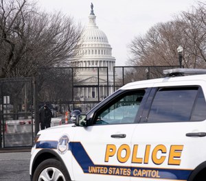 Security surrounds the U.S. Capitol in Washington, Friday, Jan. 15, 2021, ahead of the inauguration of President-elect Joe Biden.