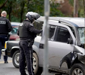 Police investigate after a driver struck and injured at least five people over a 20-block stretch of Southeast Portland, Ore., before crashing and fleeing on Monday, Jan. 25, 2021, according to witnesses.