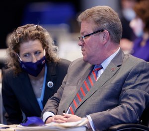 State Sen. Jen Kiggans, R-Virginia Beach, speaks with Sen. Bill Stanley, R-Franklin County, as Senate Bill 1165 was being discussed.