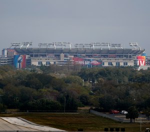 Raymond James Stadium rises in the distance ahead of Super Bowl 55 Saturday, Feb. 6, 2021, in Tampa, Fla.