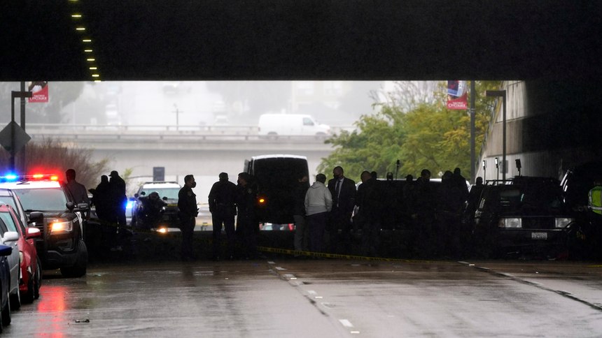 Emergency crews work at the scene of a deadly accident Monday, March 15, 2021, in San Diego. (AP Photo/Gregory Bull)