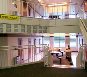 Inmates sit in one of the cottages at the Circleville Juvenile Correctional Facility in Circleville, Ohio. Seventeen-year-old Robert Wright was found dead in his cell last year.