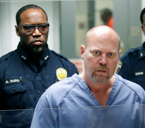 In this Oct. 25, 2018, file photo, Gregory Bush is arraigned on two counts of murder and 10 counts of wanton endangerment in Louisville, Ky.