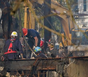 Authorities are continuing to investigate the blaze at an assisted living facility that killed Spring Valley Firefighter Jared Lloyd and a resident.