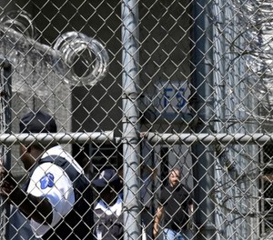 Prison staff work at Lee Correctional Institution in Bishopville, S.C.