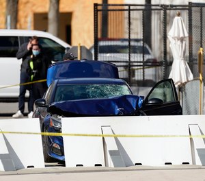 The car that crashed into a barrier on Capitol Hill is seen near the Senate side of the U.S. Capitol in Washington, Friday, April 2, 2021.